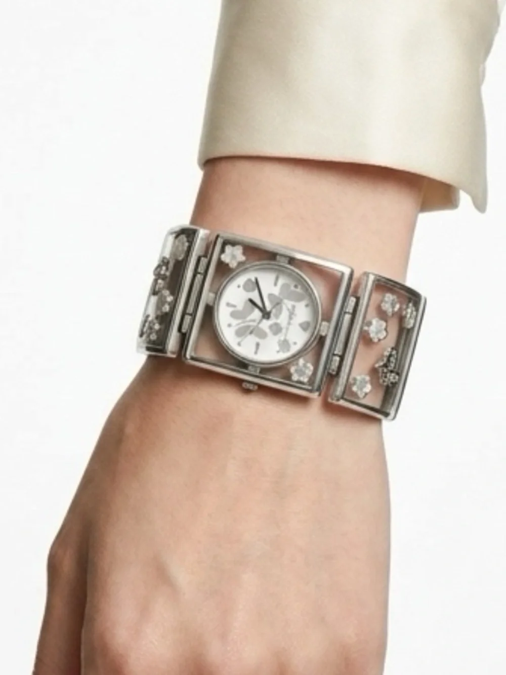 Brighton Gainesville watch features a design silver-tone butterflies & flowers.